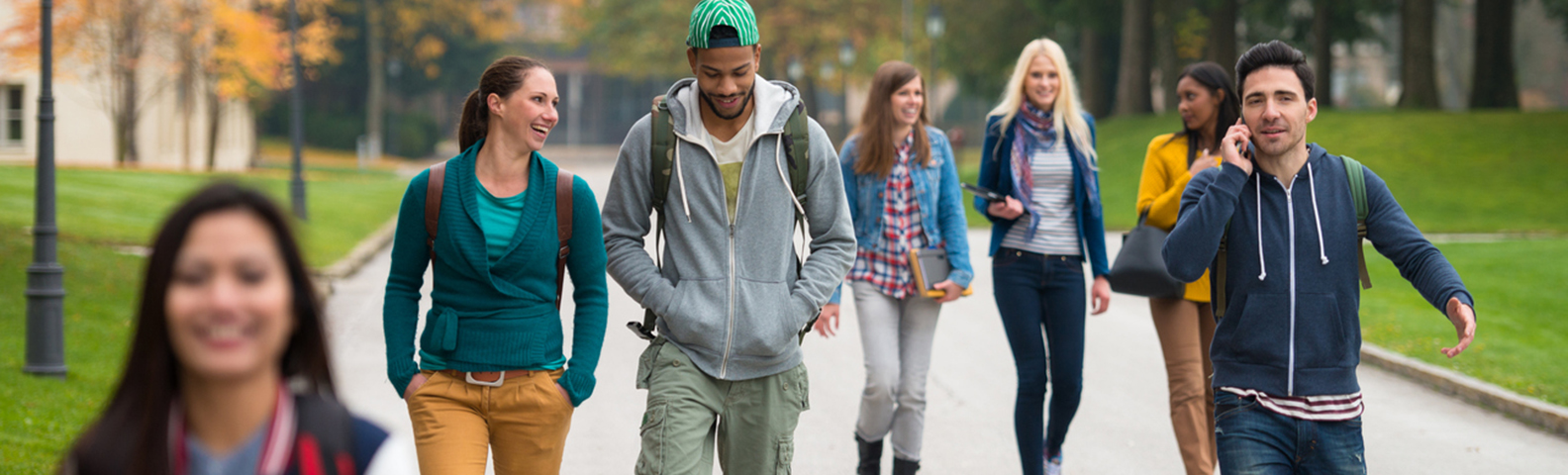 A group of students walking through campus